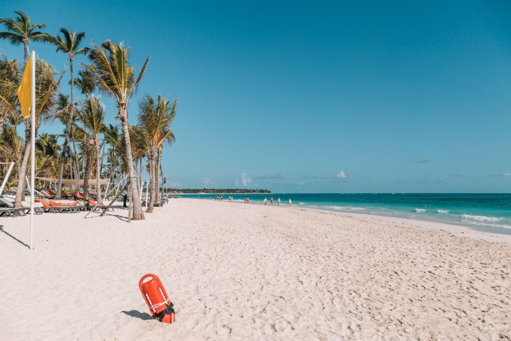 Explore the serene white sands and turquoise waters of Punta Cana's picturesque beach in the Dominican Republic.