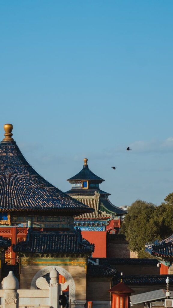 Beautiful view of the Temple of Heaven in Beijing, highlighting traditional Chinese architecture under a clear sky.