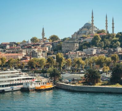 Beautiful daytime view of Istanbul featuring the iconic Suleymaniye Mosque and vibrant waterfront.