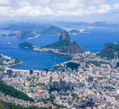 Stunning aerial view capturing Sugarloaf Mountain and Rio de Janeiro's vibrant cityscape.