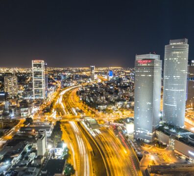 time-lapse photography of moving vehicles on road