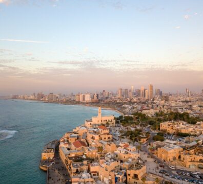 aerial view photography of city beside body of water