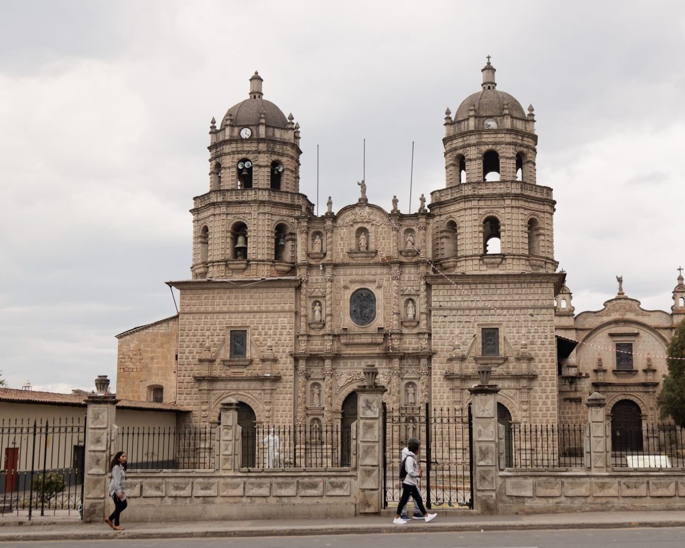 Beautiful stone facade of a historic church in Cajamarca, Peru, capturing the essence of colonial architecture.