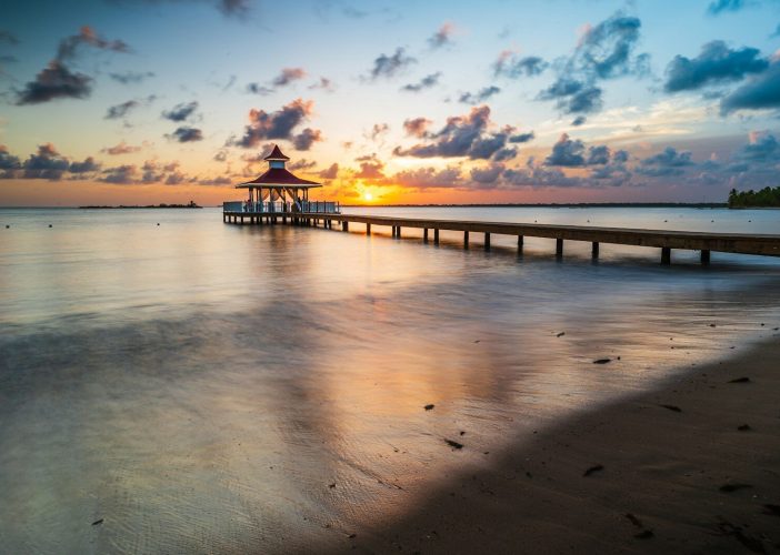 a pier that is sitting in the water